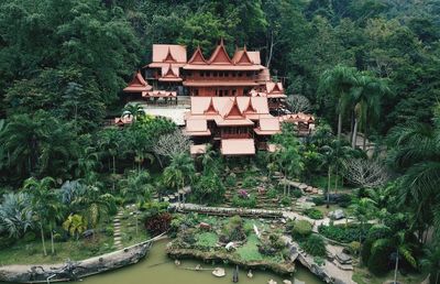 View of building with trees in garden