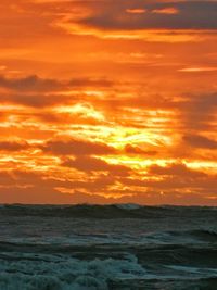 Scenic view of sea at sunset