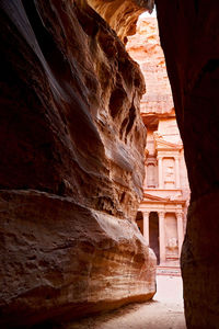 View of historic building seen through cave