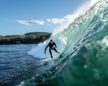  view of man surfing in sea