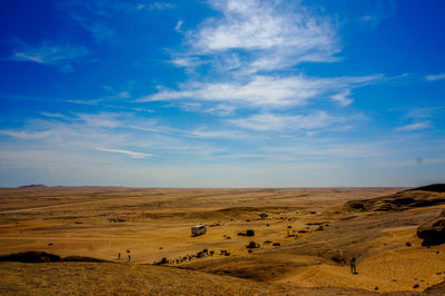 Scenic view of barren landscape against sky