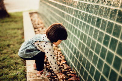 High angle view of girl standing outdoors