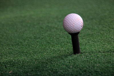 Close-up of ball on grassland