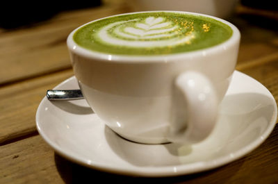 Close-up of matcha tea on table