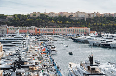 Boats moored at harbor