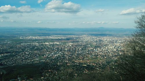 Aerial view of cityscape against sky