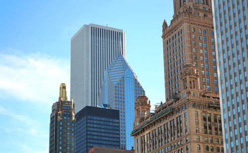 Low angle view of skyscrapers against sky