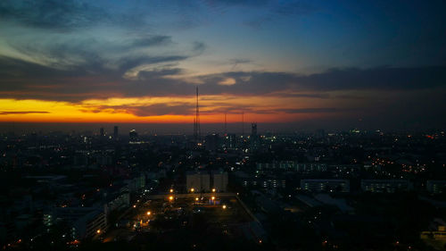 Aerial view of city during sunset