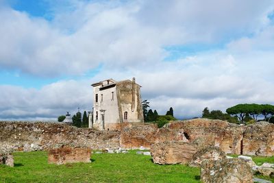 View of historical building against cloudy sky