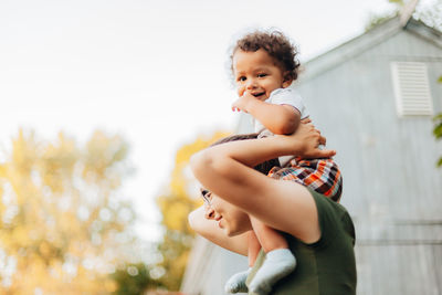 Portrait of cute baby mother with daughter