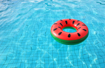 High angle view of inflatable ring floating on swimming pool