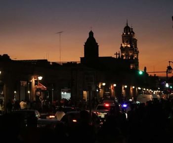 Silhouette of city at night