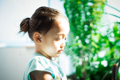 Portrait of cute boy looking away