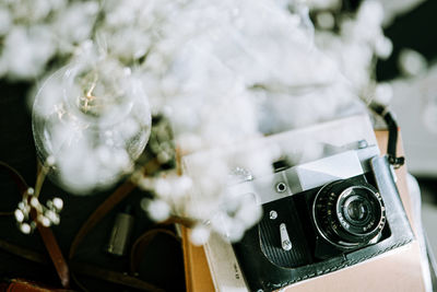 High angle view of camera on table