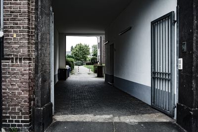 Man walking on brick wall