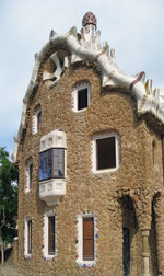 Low angle view of old building against sky