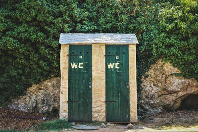 Public bathrooms on  tree in forest