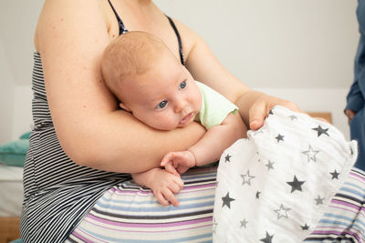 Portrait of cute baby girl at home