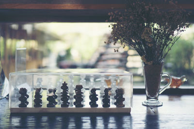Close-up of chess board on table