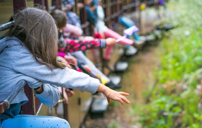 Children traveling in miniature train