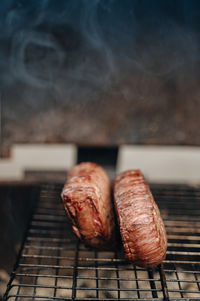 Close-up of meat on barbecue grill