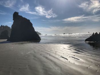 Scenic view of beach against sky