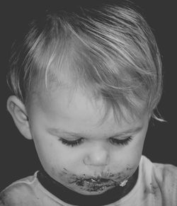 Close-up of baby boy with messy face