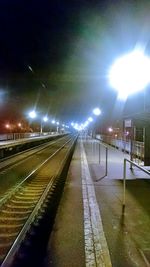 Railroad tracks at night
