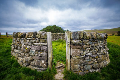 Low angle view of old ruins against sky