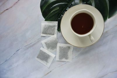 High angle view of coffee cup on table