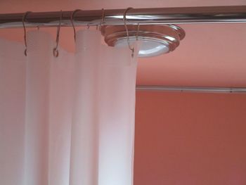 Low angle view of empty hanging on rack at home