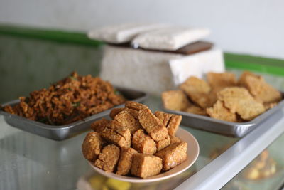 Close-up of food in plates on table