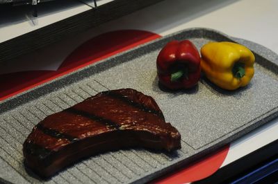 High angle view of fruits in plate on table