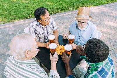 High angle view of people sitting outdoors