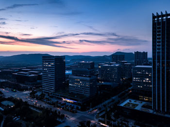 High angle view of city at sunset