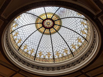 Low angle view of skylight in building