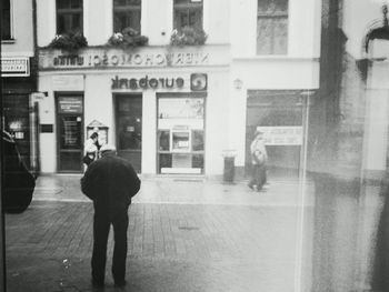 Woman standing in city