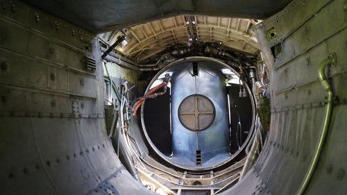 Close-up of inside of british electric lighting harrier plane with engine removed 