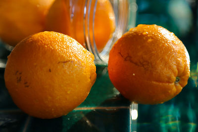 Close-up of orange slices on table