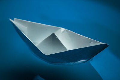 Close-up of paper boat in water