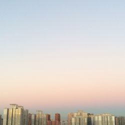 View of cityscape against clear sky