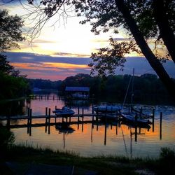 Scenic view of lake at sunset