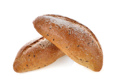 Close-up of bread on white background