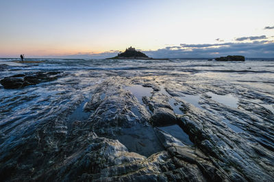 Scenic view of sea against sky during sunset