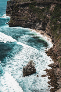 Scenic view of rock formation in sea