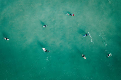 High angle view of people on sea