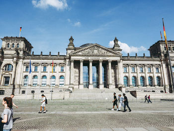 Group of people in front of building