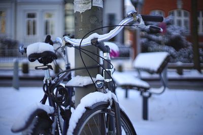 Close-up of bicycle parked on street