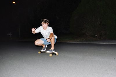 Full length of boy skateboarding