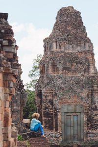 Side view of woman in temple